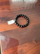 Bracelet en Onyx pierre contre le mauvais oeil Taille des perles: 10mm